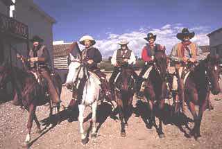 Five mounted on horseback for historical movie film reenactment including horse training